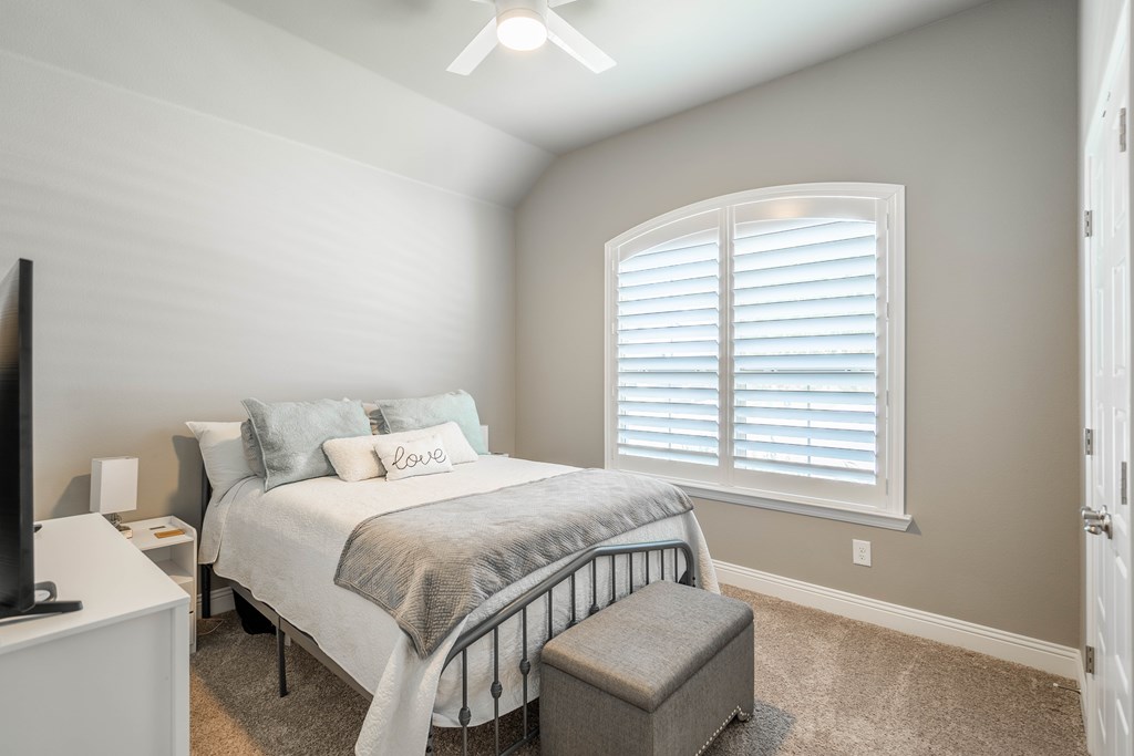 Bedroom with plantation shutters 